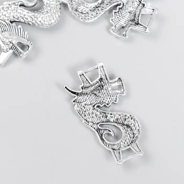 Коннектор для творчества металл 2 ушка  Коннектор для творчества металл 2 ушка "Китайский дракон" серебро 3,6х2 см