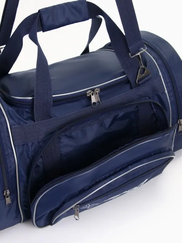 Сумка дорожная на молнии, 4 наружных кармана, длинный ремень, цвет синий Сумка дорожная на молнии, 4 наружных кармана, длинный ремень, цвет синий