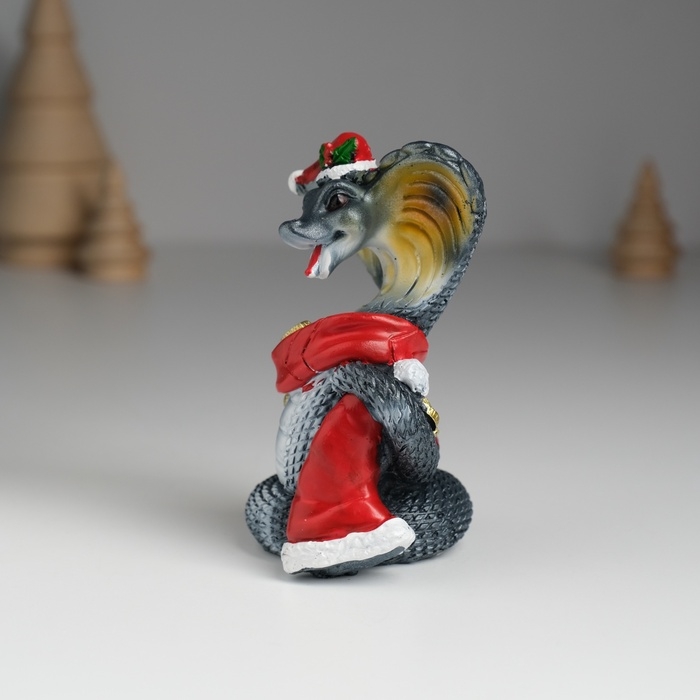 Сувенир полистоун Сувенир полистоун "Змея тёмная в красной шапке и шарфике с монетками" МИКС 6,2х4,7х9 см