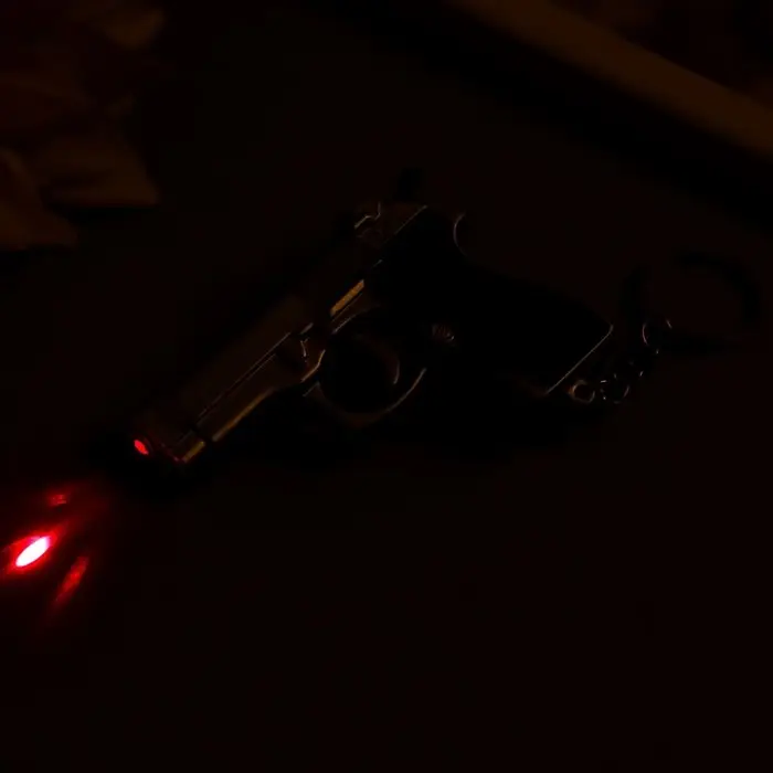 Фонарик свет+лазер на кольце  Фонарик свет+лазер на кольце "Пистолет" 2 режима  7х5х1,7 см