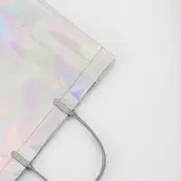 Пакет подарочный ПВХ, голография, серебро, пластикова ручка, 32×28×11 см Пакет подарочный ПВХ, голография, серебро, пластикова ручка, 32×28×11 см