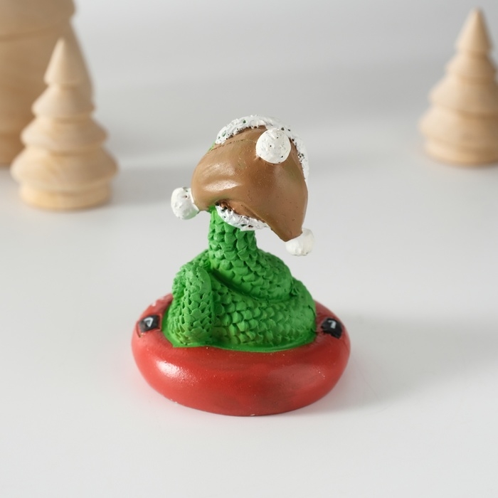 Сувенир полистоун Сувенир полистоун "Змей в шапке-ушанке на тюбинге" 5,2х6 см