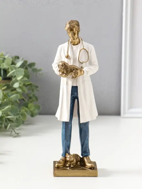 Сувенир полистоун "Мужчина-ветеринар в белом халате с щенком" 25,5 см