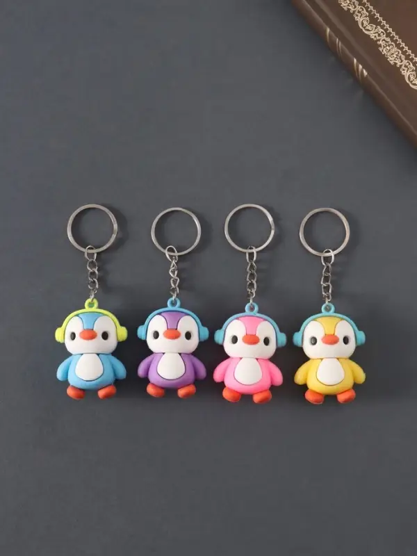 Брелок резина Брелок резина "Пингвин в наушниках" МИКС 4,7х3,5х2,2 см