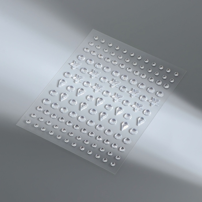 Стразы самоклеящиеся фигурные «Ассорти», 128 шт на листе, цвет серебряный Стразы самоклеящиеся фигурные «Ассорти», 128 шт на листе, цвет серебряный