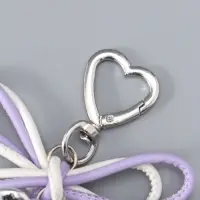 Брелок на карабине "Двойной бант с сердцем" бело-сиреневый 14х9х1,5 см