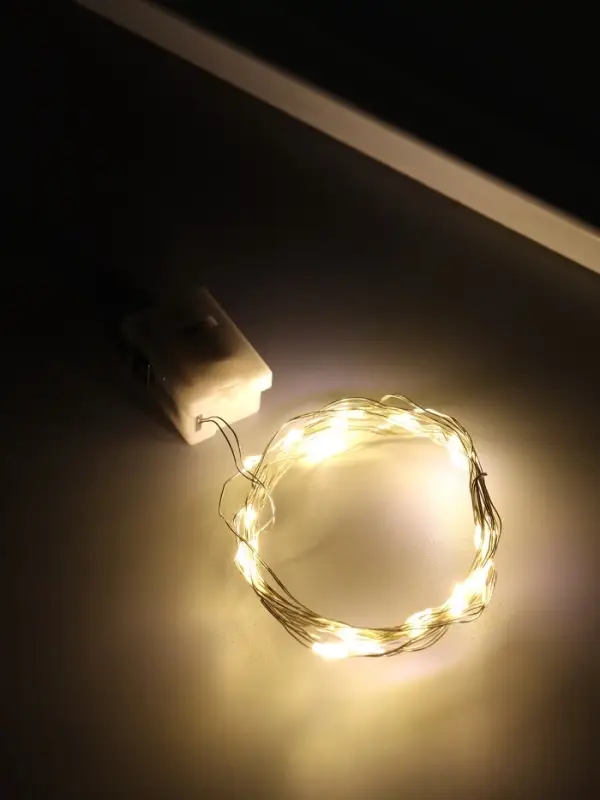 Нить светодиодная для сувениров мульти 20 диодов длина 2 м от батареек 3хCR1130 набор 10 шт   108885