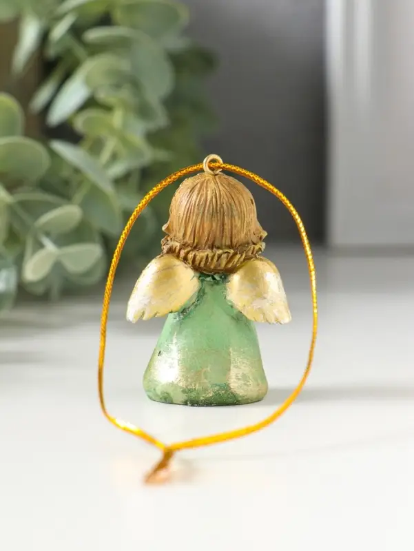 Сувенир полистоун "Ангелочек со звёздами на зелёном платье, со свечой в руках" 3,8х2,6х5 см   109157