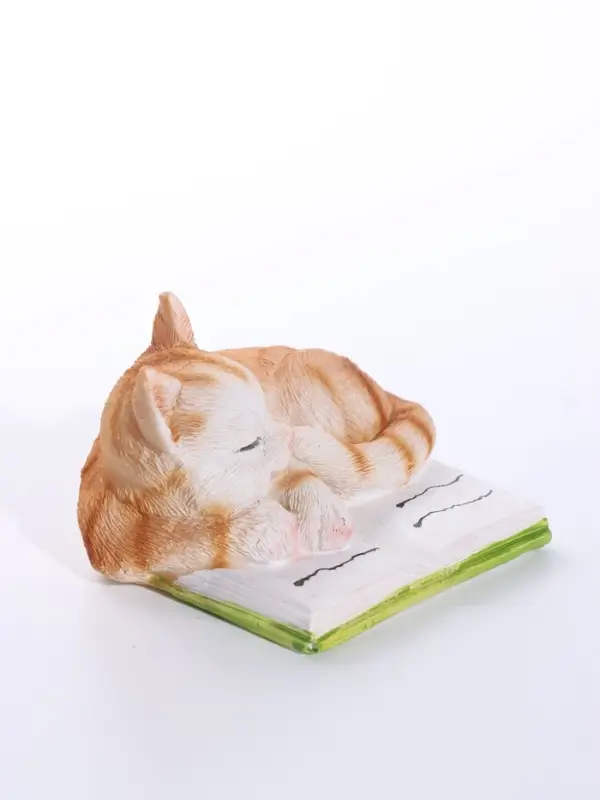Сувенир полистоун "Спящий котёнок на книге" рыжий 9,5х9х5,7 см