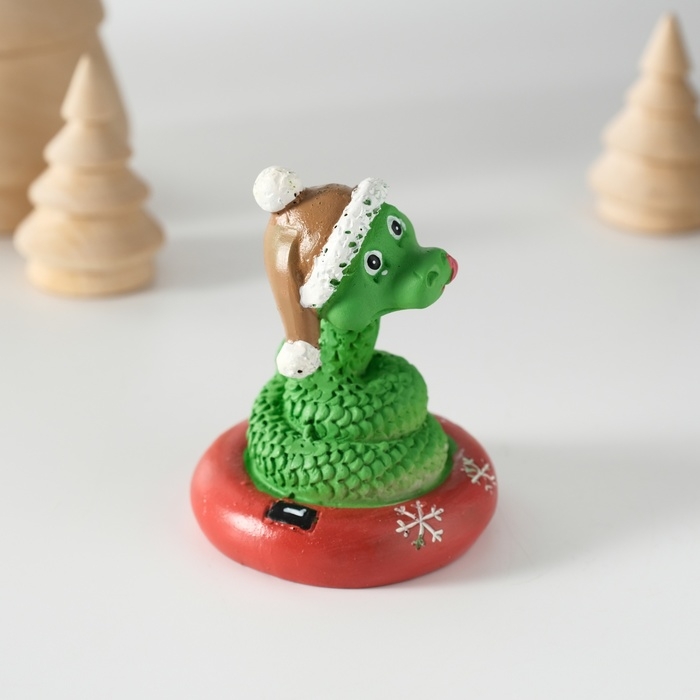 Сувенир полистоун Сувенир полистоун "Змей в шапке-ушанке на тюбинге" 5,2х6 см