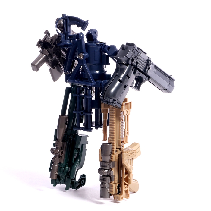 Робот «Миниган», трансформируется, с металлическими элементами Робот «Миниган», трансформируется, с металлическими элементами