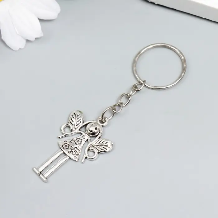 Брелок металл "Девочка-фея" серебро 3х2,7 см