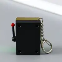 Брелок пластик "Игровой автомат - казино" зелёно-золотой 2,7х3,4х5 см