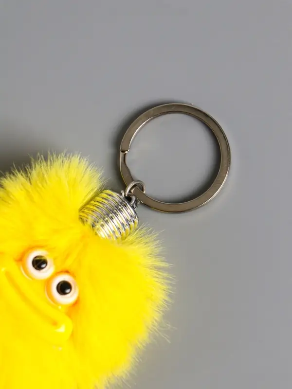 Пушистик на кольце "Чудик" жёлтый 19х4х4 см