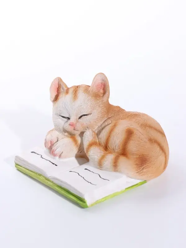 Сувенир полистоун "Спящий котёнок на книге" рыжий 9,5х9х5,7 см