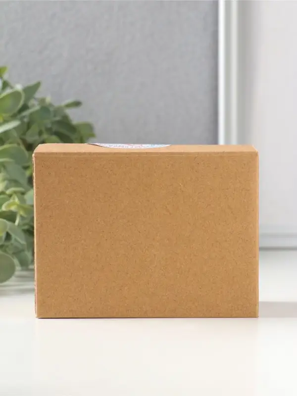 Сувенир керамика "Белый котёнок с желтым цветочком" 5,2х5х7,6 см