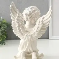 Статуэтка "Ангел сидячий" 29х19,5х13 см Статуэтка "Ангел сидячий" 29х19,5х13 см