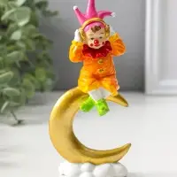 Сувенир полистоун "Клоун в наушниках на золотом месяце" яркий разноцветный 16,5 см