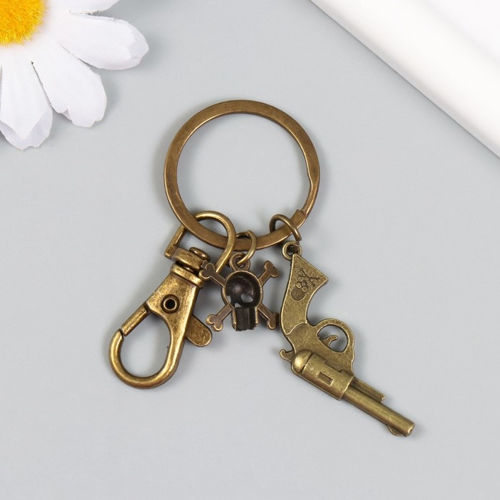 Брелок металл с карабином  Брелок металл с карабином "Револьвер и череп" бронза 7,5 см