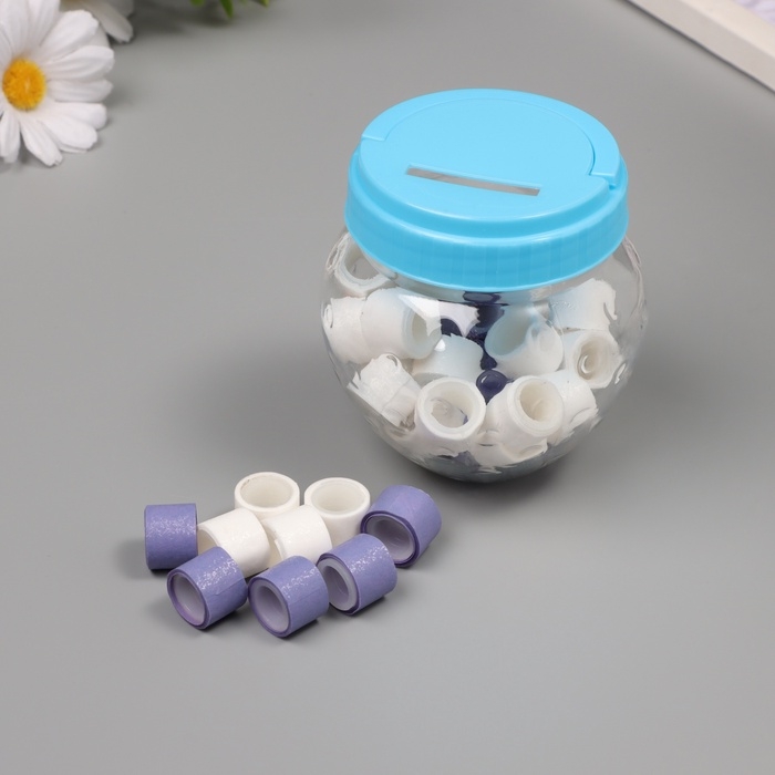 Клейкая лента пластик в банке  Клейкая лента пластик в банке "Белый и фиолетовый" н-р 40 шт 1,2 см, дл. 0,9 м 7х7х9 см