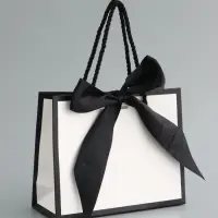 Пакет подарочный, белый, с бантом, 19 х 15 х 7 см