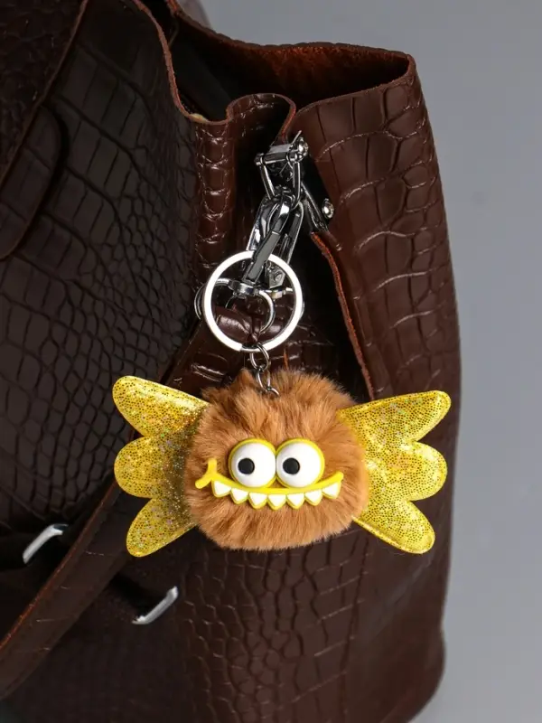 Пушистик на кольце "Муха" беж 9х10х5 см