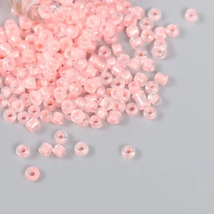 Бисер 8/0 в бутылочке  Бисер 8/0 в бутылочке "Полупрозрачный с цв.серединой. Роза" светится под УФ 20 гр 6х2х2 см