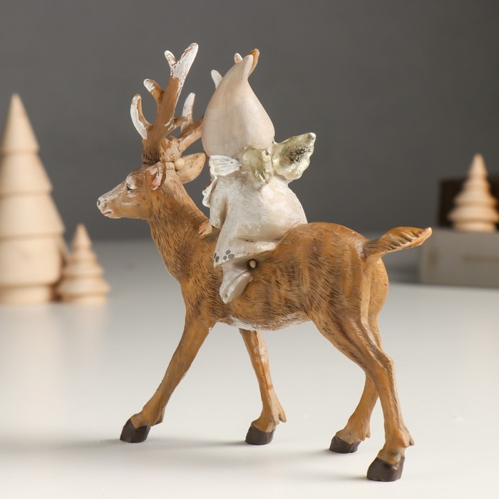 Сувенир полистоун  Сувенир полистоун "Малышка-ангел в сером наряде, верхом на олене" 5,5х14х14,5 см