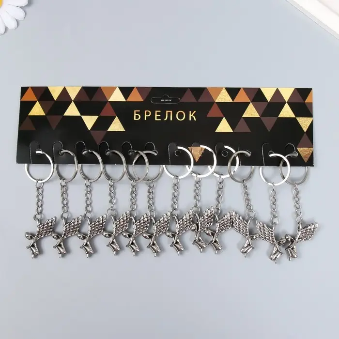 Брелок металл "Девушка-ангел - одиночество" 3х0,5х3 см