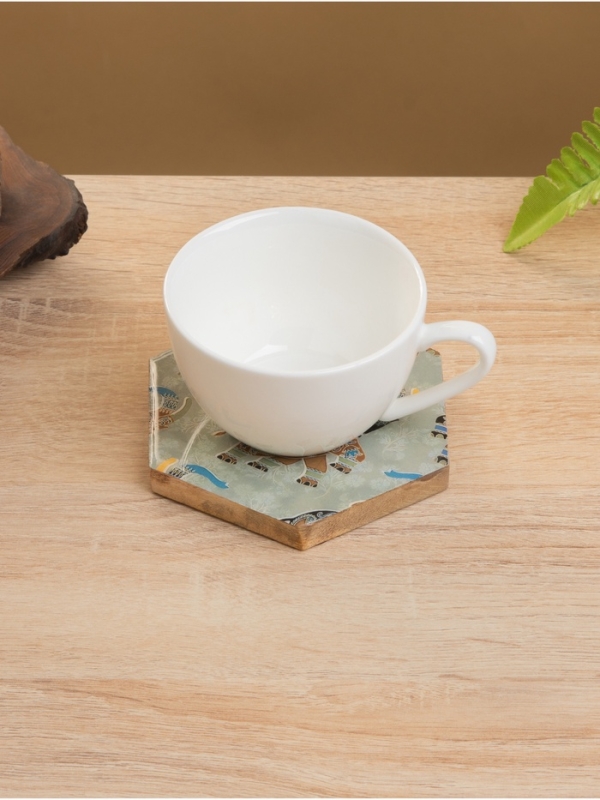 Подставка под горячее (набор 4 шт)  Подставка под горячее (набор 4 шт) "Мудрый слон" дерево манго 15х13х5 см