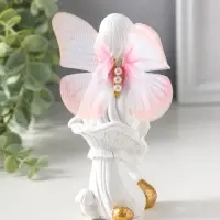 Сувенир полистоун "Девочка-бабочка на грибочке" белый 5,5х7х14,5 см