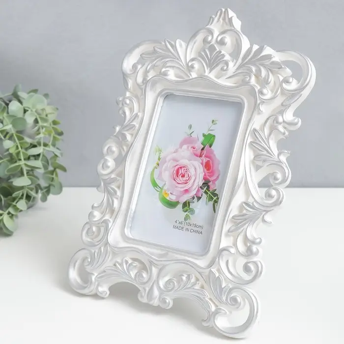 Фоторамка пластик 10х15 см Фоторамка пластик 10х15 см "Королевские пышные листья" серебро 28х20,5 см