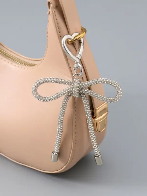 Брелок на карабине "Бант со стразами" серебро 11х7,5х1,5 см