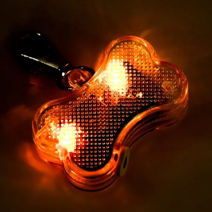 Маячок-адресник &laquo;Косточка&raquo; с наклейкой под записку, 3 режима свечения, пластик, металл, жёлтый