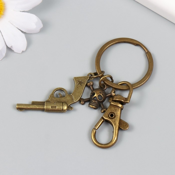 Брелок металл с карабином  Брелок металл с карабином "Револьвер и череп" бронза 7,5 см