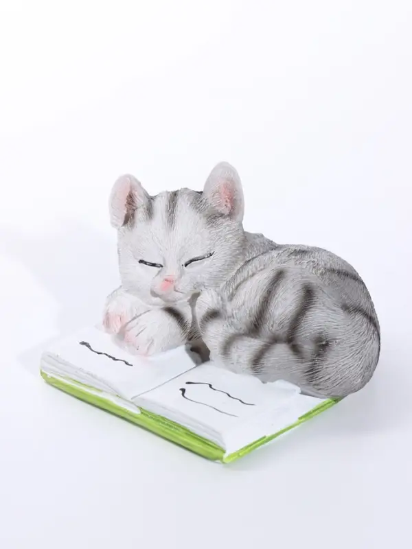 Сувенир полистоун "Спящий котёнок на книге" серый 9,5х9х5,7 см