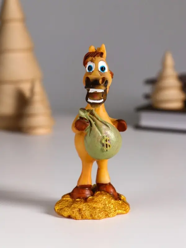 Сувенир полистоун Сувенир полистоун "Коник на монетах с мешком золота" 4х3,6х9 см