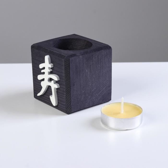 Свеча в деревянном подсвечнике  Свеча в деревянном подсвечнике "Куб, Иероглифы. Долголетие", эбен, аромат манго