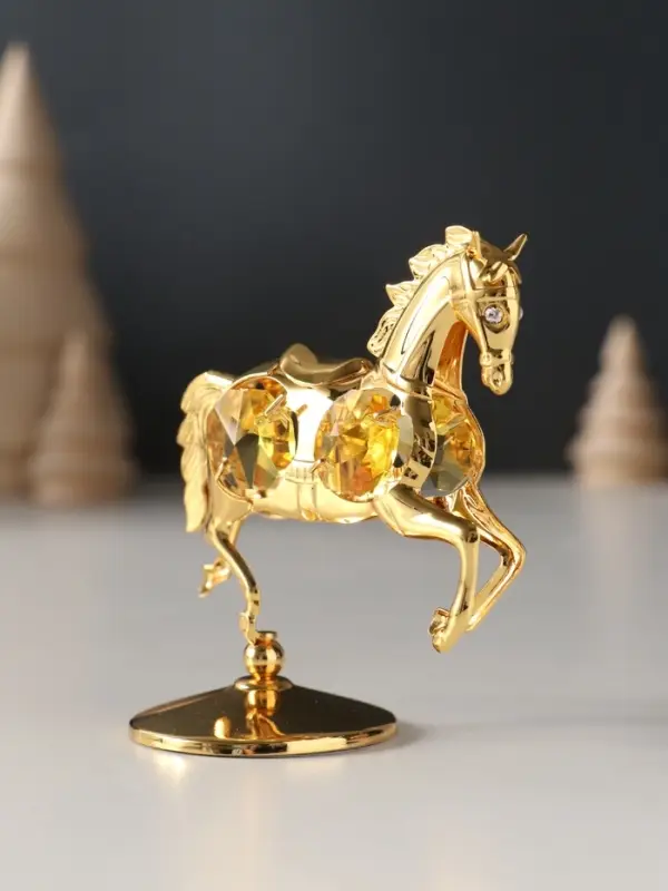 Сувенир Лошадка маленькая с 4-мя желтыми хрусталиками на подставке, 6,5х4х8,5 см. Сувенир Лошадка маленькая с 4-мя желтыми хрусталиками на подставке, 6,5х4х8,5 см.