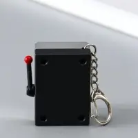 Брелок пластик "Игровой автомат - казино" серебро 2,7х3,4х5 см Брелок пластик "Игровой автомат - казино" серебро 2,7х3,4х5 см