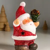 Сувенир керамика свет "Дед Мороз в красной шубке с еловой веточкой" 10х7,5х14,5 см Сувенир керамика свет "Дед Мороз в красной шубке с еловой веточкой" 10х7,5х14,5 см