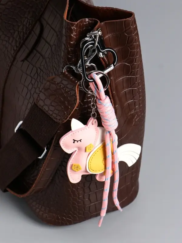 Брелок на карабине кожзам, текстиль  Брелок на карабине кожзам, текстиль "Единорог с крыльями" розовый, с узлом 24х10,5х1,5 см