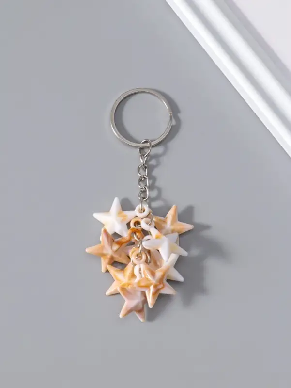 Брелок пластик "Звёзды" под песочный мрамор 9 шт 2х2,5х7 см