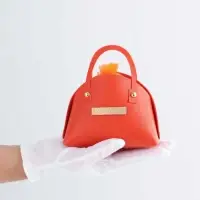 Кожанная подарочная сумочка 14 х 6,5 х 12,8 см оранжевая