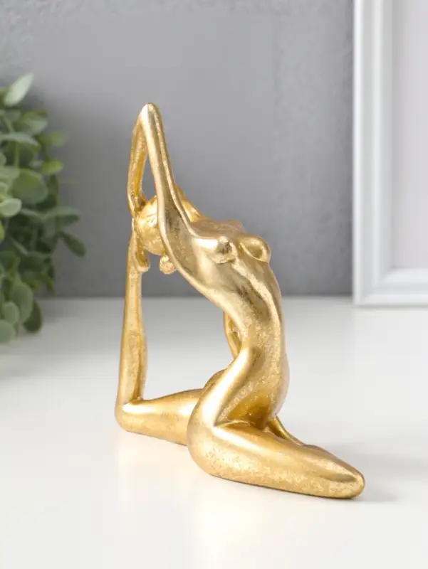 Сувенир полистоун "Обнажённая девушка - йогиня" золото 6,2х16х15,5 см