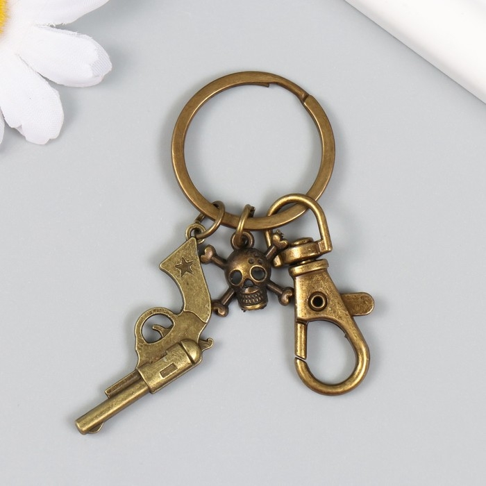 Брелок металл с карабином  Брелок металл с карабином "Револьвер и череп" бронза 7,5 см