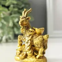 Нэцкэ полистоун "Козёл с китайскими монетами и золотыми слитками" бронза 4,2х7х9,4 см Нэцкэ полистоун "Козёл с китайскими монетами и золотыми слитками" бронза 4,2х7х9,4 см