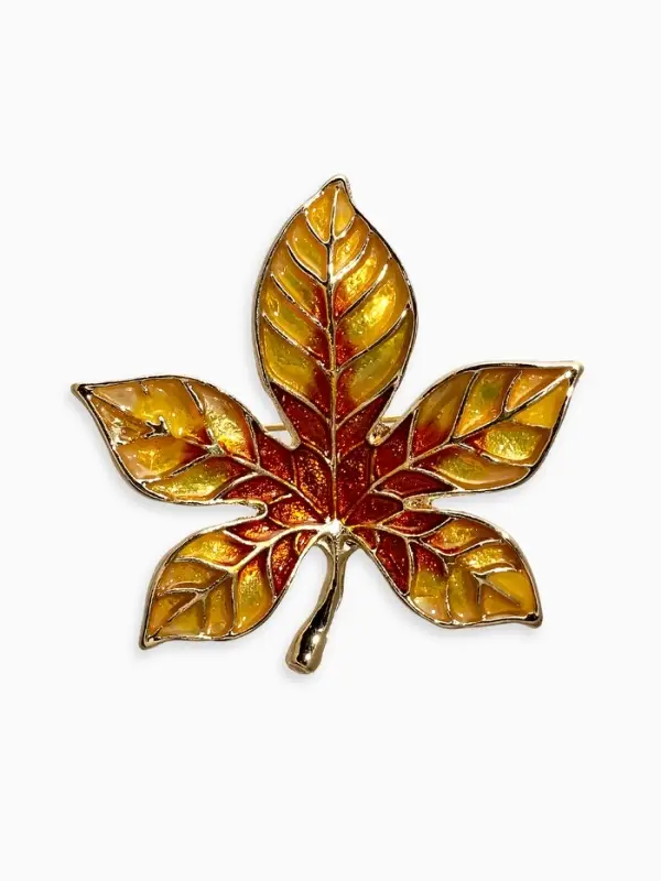 Брошь "Лист Клёна" прозрачная эмаль, цвет жёлто-коричневый в золоте