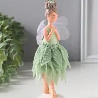 Сувенир полистоун "Девочка-фея с цветком в волосах, в зелёной юбке" 6,5х5,7х21,5 см