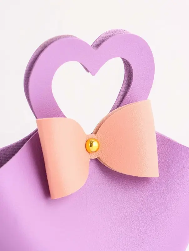 Кожаная подарочная сумочка для бижутерии и сувениров, сиреневая с бантом, 10.5&times;5&times;6 см